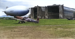 Spitfire LF VIII of 451 Squadron RAAF with USN blimp K-112 of Airship Patrol Squadron ZP-14 at French naval air base, Cuers-Pierrefeu, near Toulon, France, Sep 1944.