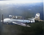 TBM-3 Avenger of Torpedo Squadron 6 flying from USS Hancock flies over ships of Task Force 58 around Okinawa, Mar-Aug 1945