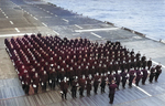 The Ship’s Chaplain leads a memorial service for President Franklin D Roosevelt on the flight deck of the training aircraft carrier USS Sable on Lake Michigan, United States, c. Apr 15 1945.