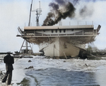 The training aircraft carrier USS Sable in the icy waters of Lake Erie on the day of her commissioning in Buffalo, New York, United States, 8 May 1943.