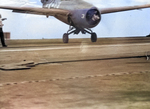 The camera catches an FM-2 Wildcat mid-bounce in a hard landing aboard the training aircraft carrier USS Sable on Lake Michigan, United States, 1943.  This aircraft probably ended up on its back, like so many did.