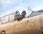 Navy Lt CV Timberlake, an LSO on the training aircraft carrier USS Sable sits in his SNJ Texan, Lake Michigan, United States, 1943-44.