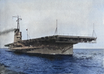 Training aircraft carrier USS Wolverine steams through the Chicago harbor on Lake Michigan, United States, 1942.