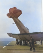 An SNJ-3C Texan noses over just before reaching the edge of the flight deck aboard the training aircraft carrier USS Wolverine on Lake Michigan, United States, 1943.