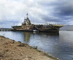 HMS Victorious moored at Berth F-10, Ford Island, Pearl Harbor, Oahu, Hawaii, Mar 4, 1943. The carrier was undergoing modifications for service during the period she was on loan to the US Fleet. Photo 1 of 2.