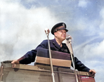 General Dwight D. Eisenhower preparing to make an address at an outdoor podium, 1944. Location unknown.