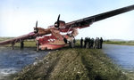 PBY-5A Catalina of the US Navy’s 4th Air Wing in the Aleutians after running off the runway’s steel matting, 1943-44. Note the aerial depth charges mounted under the wings.