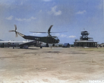 Sikorsky R-4B Helicopter delivering spare aircraft parts to the B-29 base at North Field, Tinian, Mariana Islands, 11 Apr 1945.