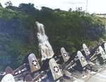 F4U-1A fighters of Navy Squadron VF-17 transiting the Panama Canal on the flight deck of an Escort Carrier, circa Aug 1943. Note the unusual National Insignia on the lower surfaces of the folded wings.