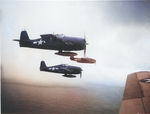 Two F6F-5N Hellcat of Marine Night Fighting Squadron VMF(N)-541 escorting a TBM-1C Avenger near Palau, 1944.