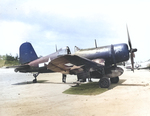 F4U-1D Corsair of Marine Squadron VMF-422 at Ie Shima Airfield, Ie Shima, Okinawa, Japan, 1945. Note the nose art on both the plane and the belly tank.