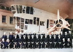 Detachment One of US Navy Lighter Than Air Utility Squadron ZJ-1 sit for a group photograph in front of airship K-28 control car, Meacham Field, Key West, Florida, United States, June 1, 1945.