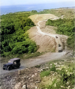 US Army Jeeps driving up Wright Road toward the area of the Japanese Gifu strongpoint on Guadalcanal, Solomon Islands, 1942.