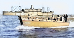 LCVP landing craft from Amphibious Transport Ship USS Hunter Liggett (background) during amphibious training near San Diego, California, United States, circa 1944. Note the LCVP’s unusual raised coxswain podium at the stern