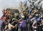 US Navy sailors assisting US Army soldiers board a Landing Craft Infantry (Large) (LCI(L)) from an LCVP landing craft, probably in southern England, UK, early June 1944.