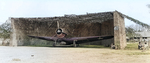 TBD Devastator in a revetment at Kaneohe Naval Air Station, Oahu, Hawaii, 1942. Note that the plane is already armed with a torpedo.