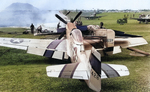 Two P-51D Mustangs of the 45th Fighter Squadron after a ground crash at South Field, Iwo Jima, June 1945. Note Mt Suribachi.