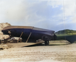 A United States Navy patrol PBY Catalina turned upside down by heavy winds at Dutch Harbor, Alaska, 2 Nov 1942. Note another PBY askew in the left background.