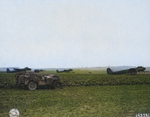 US Army personnel observing dummy Junkers Ju-88 bombers left behind at the airfield at Épinay, France, 2 Sep 1944.