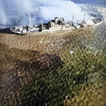 USS Essex strike photo of a Japanese freighter just after being struck by a torpedo in the port bow off Cap St Jacques, French Indochina (Vietnam), 12 Jan 1945. This ship would take two more torpedoes before sinking