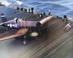 F4U Corsair of Marine Fighting Squadron VMF-124 on the flight deck of USS Essex, 25 Jan 1945.