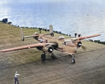 PBJ-1H Mitchell strafer bomber on the flight deck of USS Shangri-La off Chesapeake Bay during trails to judge the suitability of the Mitchell as a carrier aircraft, 15 Nov 1944.