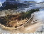 Strike photo stitched together from photos taken by USS Langley aircraft showing severe damage to the runway and the surrounding areas on Engebi Island (now Enjebi), Eniwetok Atoll, Marshall Islands, 11 Feb 1944.