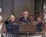 President Franklin Roosevelt during his inauguration ceremony on the west portico of the White House, Washington DC, United States, 20 Jan 1945. Note Harry Truman seated on the dias.