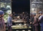 After liberating Dachau concentration camp, members of the US 42nd Division inspecting a railroad carriage full of dead prisoners, May 1945.