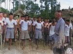 Lieutenant General Joseph Stilwell speaking to war-disabled Chinese troops at a rehabilitation camp on the Ledo Road, Assam, India, 15 Jul 1944