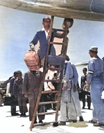 Aboard two Mitsubishi G4M ‘Betty’ bombers in surrender markings, a Japanese delegation stopped at Ie Jima, Ryukyu Islands en route Manila, Philippines for a surrender briefing, 19 Aug 1945. Photo 11 of 12.