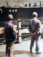 Japanese Navy personnel preparing to be transported aboard USS Missouri, 27 Aug 1945; note USS Nicholas in background