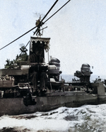 A Japanese harbor pilot being taken aboard USS Missouri from USS Nicholas in a boatswain