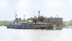 Elco 80-foot torpedo boats PT-126 and PT-159 at a floating drydock, 1944-45. Note mottled paint scheme, Mark XIII aerial torpedoes, Bofors 40mm guns aft, and 37mm cannon forward.