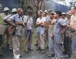 Brigadier General Gilbert Cheves and Lieutenant General Joseph Stilwell speaking with non-commissioned officers, Calcutta, India, 30 Jul 1944