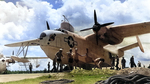 United States Navy or Coast Guard beaching crews working around a PBM-5 Mariner on the ramp of an unknown seaplane base in the Atlantic area, 1944-45. Note the unusual squadron insignia on the nose.