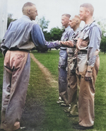 Lieutenant General Joseph Stilwell awarding the Purple Heart medal to Lieutenant Colonel Frank Merrill, India, 1942