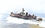 PT-490, an 80-foot Elco motor torpedo boat with MTB Squadron 33, transporting Gen Douglas MacArthur, LGen Robert Eichelberger, and staff from Iloilo on Panay to Bacolod on Negros in the Philippines, 7 Jun 1945.