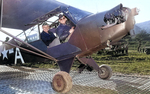 General Dwight Eisenhower pausing for the camera before taking off in a Piper L-4 Grasshopper scout plane in Italy, circa Aug 1943