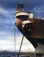 Bow of the battleship USS Missouri in Sagami Wan, Japan, 30 Aug 1945. Note the Jack flying from the jackstaff and Mount Fuji between Missouri’s bow and anchor chain.