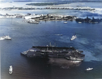 Floating Drydock YFD-2 arriving in Pearl Harbor, Hawaii, 23 Aug 1940. Note that it is still painted with markings from the Naval Station at New Orleans, Louisiana, United States.