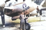 A crew chief with the 51st Fighter Squadron in front of the P-38J Lightning “Rebel” at Howard Field, Panama Canal Zone, 1944-45.