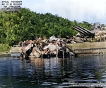 Torpedo damage to the stern of USS Portland as she was undergoing temporary repairs at Tulagi, Solomon Islands. The blast took off Portland’s two inboard propellers, jammed the rudder, and froze the No. 3 turret