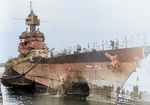 Battleship USS Maryland entering Drydock No. 2 at Pearl Harbor, Hawaii 11 Jul 1944 for repairs to her bow caused by an aerial torpedo that struck the ship while at anchor in Saipan Harbor, Mariana Islands 22 Jun 1944.