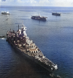 USS Missouri moored in Apra Harbor, Guam, Mariana Islands, 18 May 1945. Note hospital ship USS Hope behind Missouri and two Casablanca-class escort carriers at right.