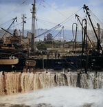 USS New Jersey being refueled in rough post-storm condition, date unknown, photo 1 of 3