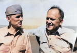 Captain Dixie Kiefer (right) talking it over with his executive officer Commander Willian O. Burch on the bridge of the USS Ticonderoga during her shakedown cruise, Jun 1944.