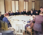 The conference table for the Yalta Conference, Feb 1945. Note Stalin, Roosevelt, and Churchill along with other officials seated around the table.