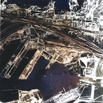 Aerial view of Gotenhafen (Gdynia), occupied Poland, Jun 1942, photo 2 of 2; photo taken by a British RAF aircraft; note battlecruiser Gneisenau (white arrow) and carrier Graf Zeppelin (bottom)