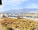 View of the camouflage netting sheds at the Manzanar Relocation Center for deported Japanese-Americans, 1 Jul 1942. Many of the camp’s internees worked in these sheds making Camouflage netting by hand for the Army.